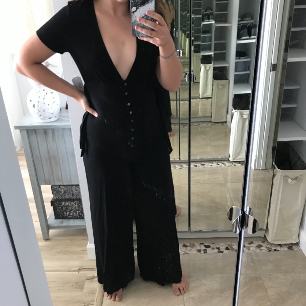 Low cut button down black lucca couture jumpsuit with tie details small